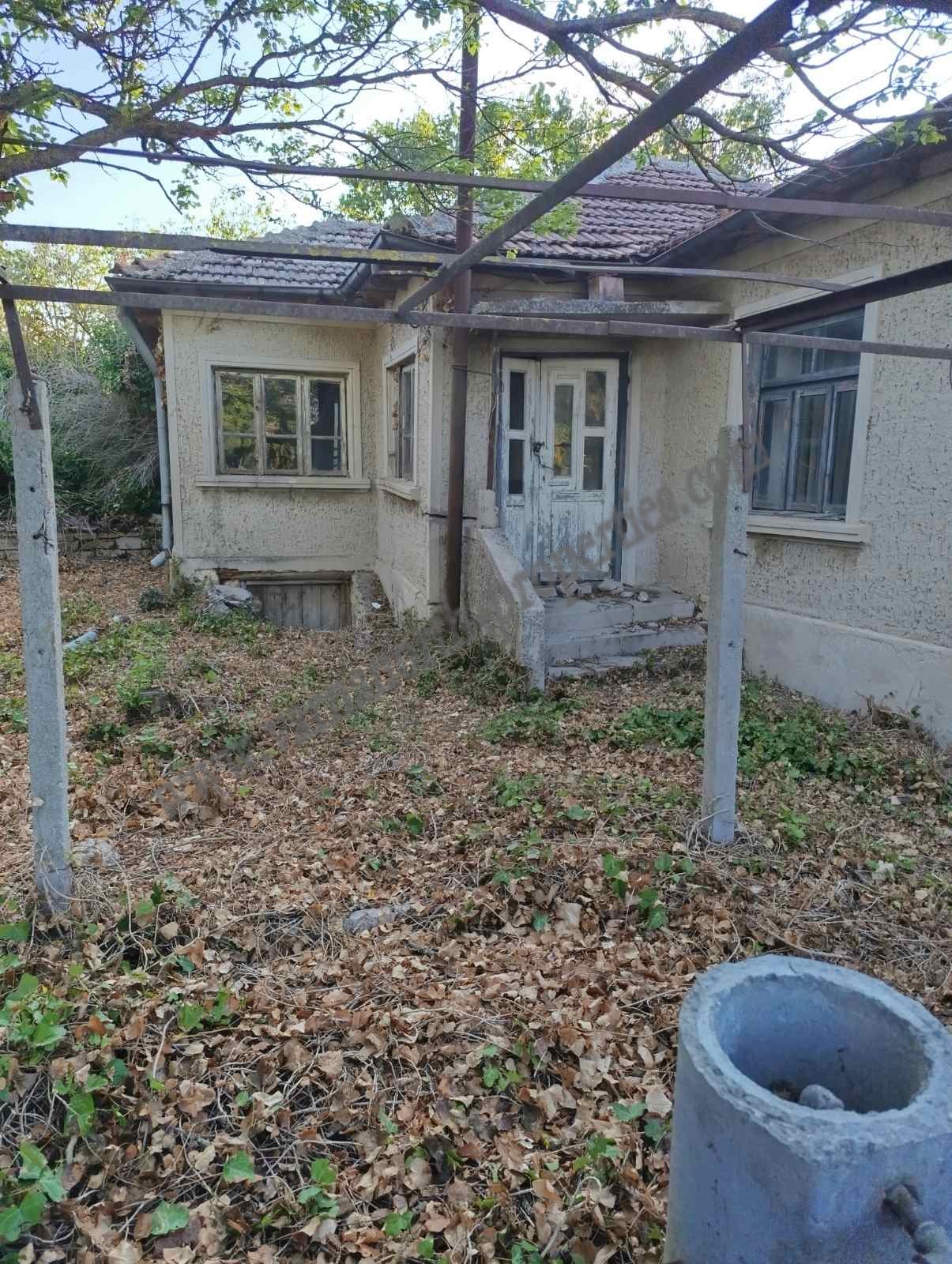Old house with a big garden in the center of Coastal village